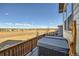 Upper deck of the house with the hot tub and views of the surroundings at 4051 Happy Hollow Dr, Castle Rock, CO 80104