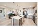 Bright kitchen with stainless steel appliances, a center island, and plenty of storage at 4051 Happy Hollow Dr, Castle Rock, CO 80104