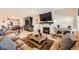 Inviting living area with a fireplace, open layout, and neutral tones at 4051 Happy Hollow Dr, Castle Rock, CO 80104