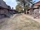 Courtyard area with grassy lawn and brick buildings at 5491 E Warren Ave # 217, Denver, CO 80222