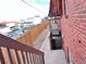 Back exterior showing stairs and basement access at 5491 E Warren Ave # 217, Denver, CO 80222