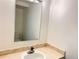 Bathroom with a single sink and large mirror at 5491 E Warren Ave # 217, Denver, CO 80222