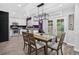 Charming dining area with seating for four, stylish lighting, and easy access to the backyard at 4333 E Bennington Ave, Castle Rock, CO 80104