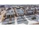 Two-story house in a neighborhood with snow on the ground at 10350 E 57Th Pl, Denver, CO 80238