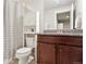 Well-appointed bathroom with granite countertop and updated vanity at 10350 E 57Th Pl, Denver, CO 80238