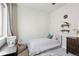 bedroom with twin bed and playful decor at 10350 E 57Th Pl, Denver, CO 80238