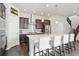 Modern kitchen with stainless steel appliances and white countertops at 10350 E 57Th Pl, Denver, CO 80238