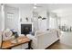 Bright living room featuring a modern fireplace, neutral furniture, and hardwood floors, creating a cozy atmosphere at 10350 E 57Th Pl, Denver, CO 80238