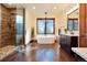 Luxurious bathroom with soaking tub, glass shower, and modern fixtures at 651 Ruby Trust Dr, Castle Rock, CO 80108