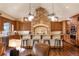 Spacious kitchen with breakfast bar, a stone arch, and wood cabinets at 651 Ruby Trust Dr, Castle Rock, CO 80108