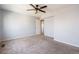 Simple bedroom with carpeted floors and neutral walls at 2314 S Troy St, Aurora, CO 80014