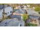 This home has a well maintained yard and outdoor seating areas with mature trees adding shade in a serene setting at 2461 Depew St, Edgewater, CO 80214
