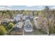 Scenic aerial view of a residential neighborhood showcasing well-maintained homes and lush trees at 2461 Depew St, Edgewater, CO 80214