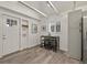 Cozy dining area with seating for three, neutral paint and modern fixtures at 2461 Depew St, Edgewater, CO 80214