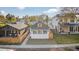 Charming home featuring a modern exterior with a cozy front yard and fresh, white paint at 2461 Depew St, Edgewater, CO 80214