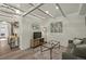 Comfortable living room with stylish decor, a TV, and plenty of natural light at 2461 Depew St, Edgewater, CO 80214