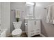 Clean bathroom with updated fixtures, neutral tones, a vanity, and shower-tub combo, creating a serene space at 9195 E Lehigh Ave # 162, Denver, CO 80237