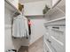 Walk-in closet with shelving and hanging space, offering ample storage and organization at 9195 E Lehigh Ave # 162, Denver, CO 80237