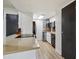 Stylish kitchen with stainless steel appliances, sleek countertops, and brick accents at 9195 E Lehigh Ave # 162, Denver, CO 80237