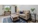 Comfortable living room with stylish decor, plush sofa, and ample natural light at 9195 E Lehigh Ave # 162, Denver, CO 80237