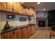 Finished basement features a fireplace, wet bar, wood cabinets, and a rustic feel at 4765 Larksong Dr, Castle Rock, CO 80109