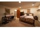 Cozy bedroom setup with a desk, and natural light at 4765 Larksong Dr, Castle Rock, CO 80109