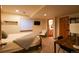 Cozy bedroom with modern touches and an ensuite bathroom at 4765 Larksong Dr, Castle Rock, CO 80109