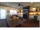 Cozy living room featuring a fireplace, built-ins, and comfortable seating at 4765 Larksong Dr, Castle Rock, CO 80109
