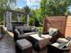 Inviting outdoor patio with pergola, hot tub, and comfortable seating, ideal for relaxation and entertaining at 4765 Larksong Dr, Castle Rock, CO 80109