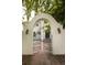 Charming gated entrance features ornate ironwork and stone pathway at 5800 E 6Th Avenue Pkwy, Denver, CO 80220