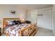 Bedroom with view, comfortable chair, and easy access to the hall at 60 S Boulder # 6031, Boulder, CO 80303