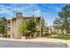 Low angle view of the exterior of a well-maintained condo building with walkways, and landscaping at 60 S Boulder # 6031, Boulder, CO 80303