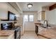 Efficient kitchen with black appliances, ample cabinet space, and a view to the outside at 60 S Boulder # 6031, Boulder, CO 80303