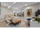 Serene bedroom with large windows, plush bedding, and stylish decorative accents at 481 Meadowleaf Ln, Highlands Ranch, CO 80126