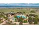 Aerial shot of a community pool area with multiple pools, seating, and landscaping at 481 Meadowleaf Ln, Highlands Ranch, CO 80126