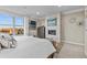 The main bedroom features a cozy fireplace, decor, and large window at 481 Meadowleaf Ln, Highlands Ranch, CO 80126