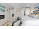 Comfortable main bedroom with a fireplace, decor, and view to the hall at 481 Meadowleaf Ln, Highlands Ranch, CO 80126