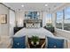 Beautiful main bedroom features dual nightstands, decor, and a view of the landscape at 481 Meadowleaf Ln, Highlands Ranch, CO 80126