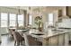 Modern kitchen with a spacious island, sleek appliances, and ample counter space at 16500 Black Rose Cir, Parker, CO 80134