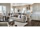 Inviting living area showcasing the kitchen and dining space at 16500 Black Rose Cir, Parker, CO 80134