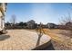 Large backyard with a stone patio, green space and play area at 35 N Newcastle Ct, Aurora, CO 80018