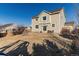 Back of house with patio and grassy area, great for entertaining at 35 N Newcastle Ct, Aurora, CO 80018