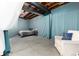 Unfinished basement area with concrete flooring and an exposed ceiling at 35 N Newcastle Ct, Aurora, CO 80018