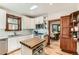 Bright kitchen with granite counters, stainless steel appliances, and a butcher block island at 1012 Fillmore St, Denver, CO 80206