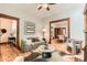 Stylish living room with wood flooring, neutral furniture, and a smooth transition into other spaces at 1012 Fillmore St, Denver, CO 80206