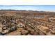 Expansive aerial view of a residential area nestled against a backdrop of mountains at 12007 W 54Th Dr, Arvada, CO 80002