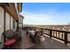 Charming deck with comfortable seating options, perfect for enjoying the scenic views at 12007 W 54Th Dr, Arvada, CO 80002