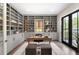 Well-appointed home office with custom built-in shelving and a stylish desk area at 2237 S Madison St, Denver, CO 80210