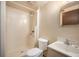 Compact full bathroom has walk-in shower and vanity sink; efficient design maximizes the space at 6369 W 69Th Ave, Arvada, CO 80003