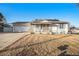 Charming single story home featuring stone accents, a covered porch, and a spacious attached two car garage at 6369 W 69Th Ave, Arvada, CO 80003